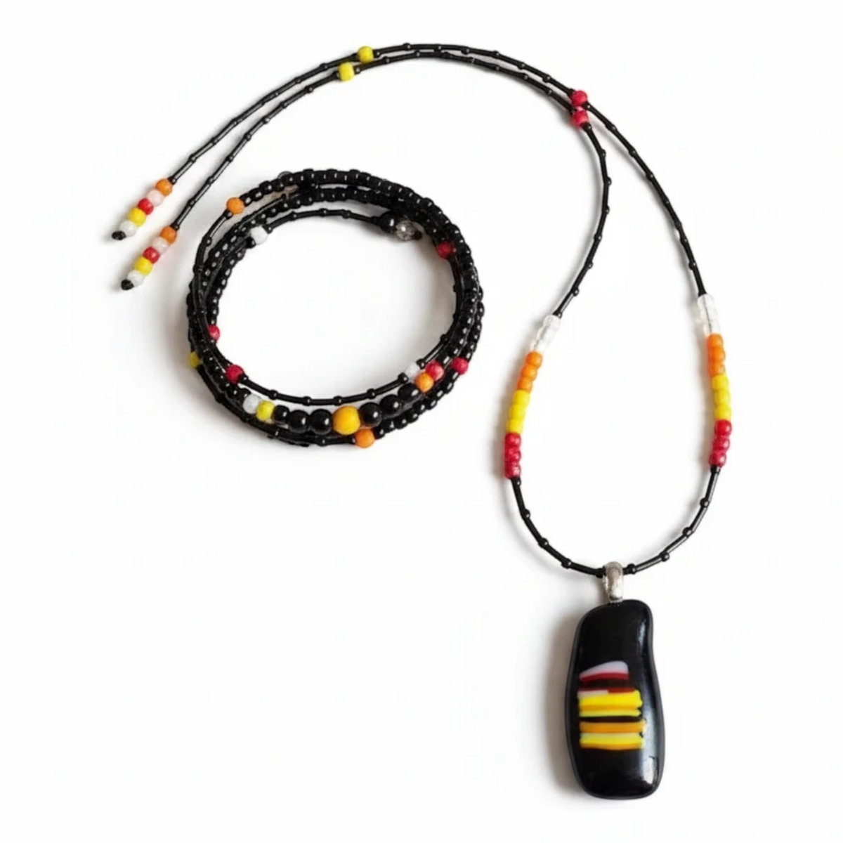 Heartfelt Creations handcrafted fused glass pendant necklace and matching multi-strand beaded wrap bracelet set