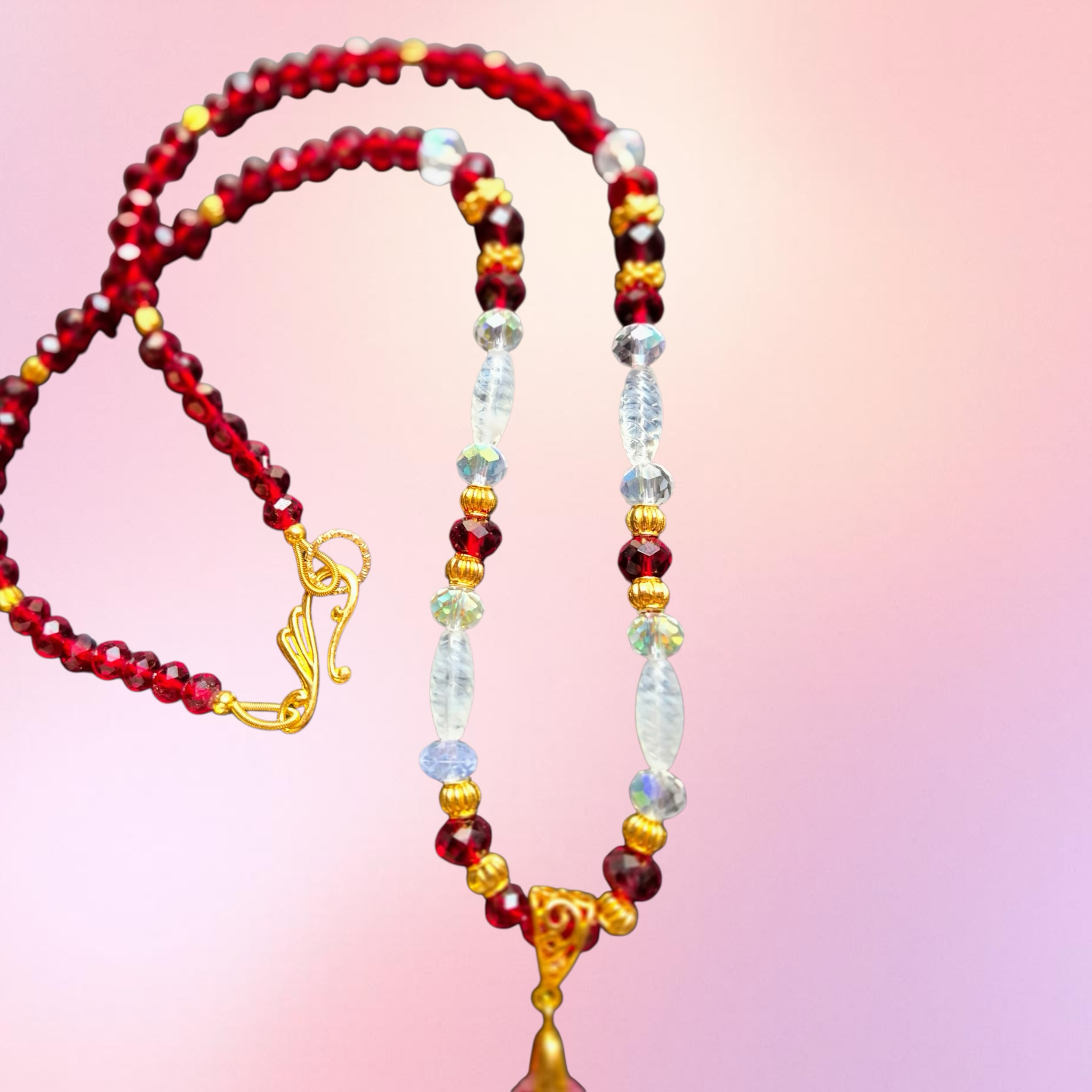Heartfelt Creations beaded necklace and bracelet set with crimson garnet, clear crystals, and gold-tone spacers. Teardrop pendant.