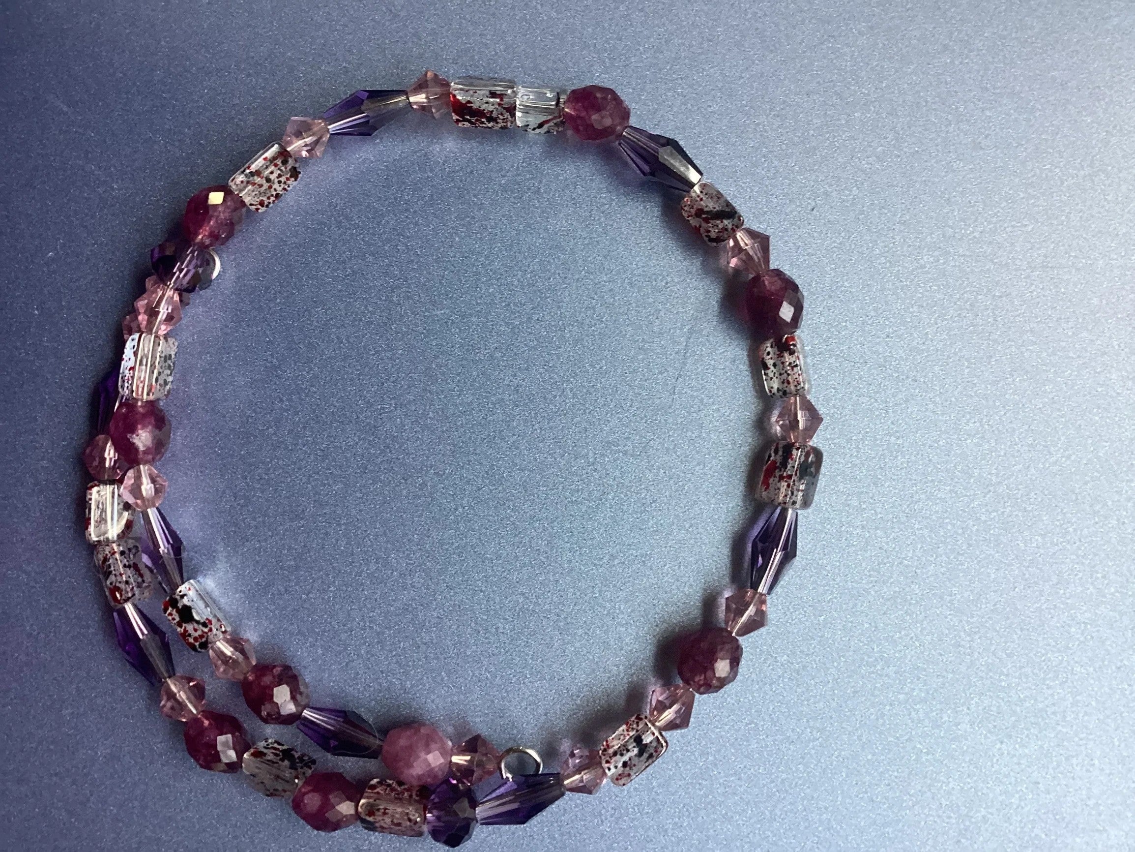 Heartfelt Creations double-strand bracelet with amethyst, rose quartz, and crystal beads, featuring unique speckled cube beads.