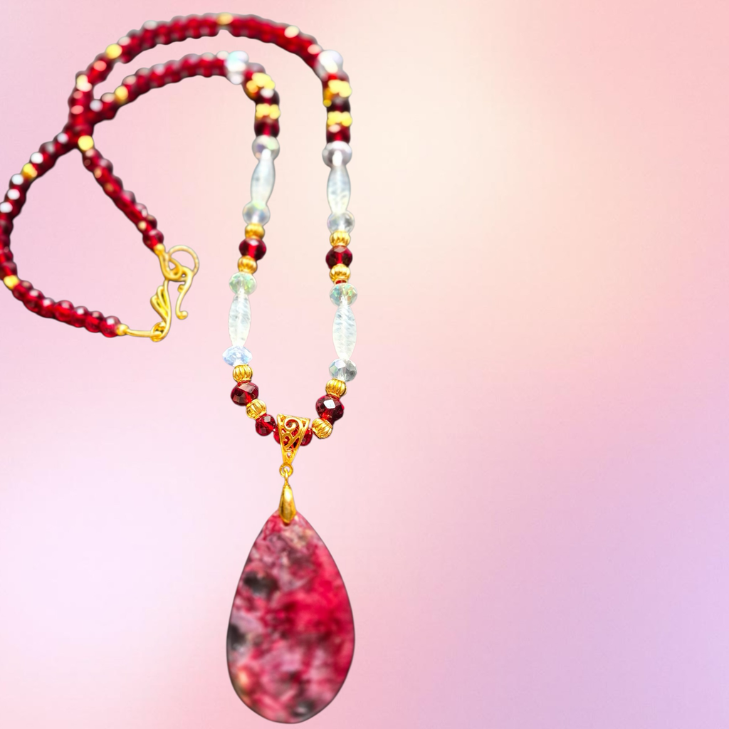Heartfelt Creations elegant beaded necklace and bracelet set with teardrop pendant, crimson garnet beads, and gold accents.