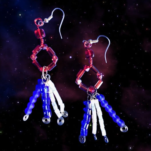 Heartfelt Creations handcrafted geometric dangle earrings with red, white, and blue beads and wire-wrapped fringe