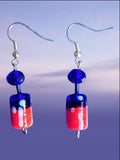 Heartfelt Creations handcrafted dangle earrings featuring royal blue and red glass cylinder beads on silver hooks.