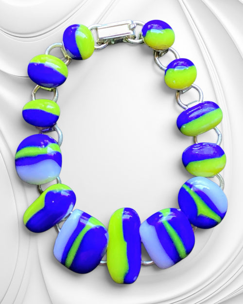 Heartfelt Creations artisan link bracelet with polished glass beads in swirling lime green, royal purple, and white.