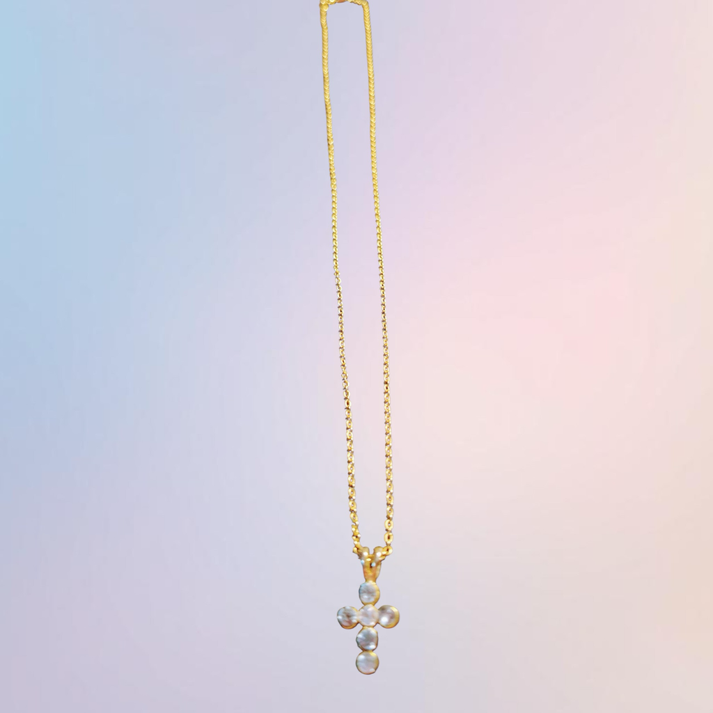 Heartfelt Creations gold cross pendant necklace with cubic zirconia stones and delicate chain.