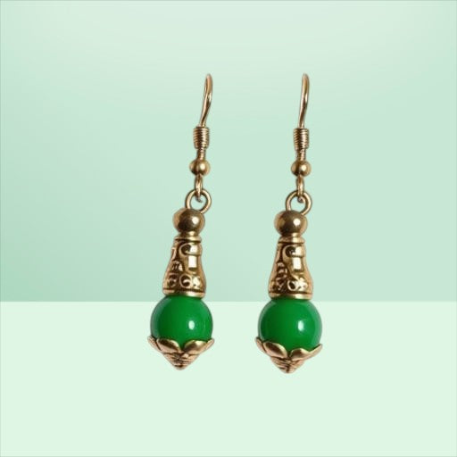Heartfelt Creations drop earrings featuring polished green beads with antique-style silver-toned filigree metalwork.