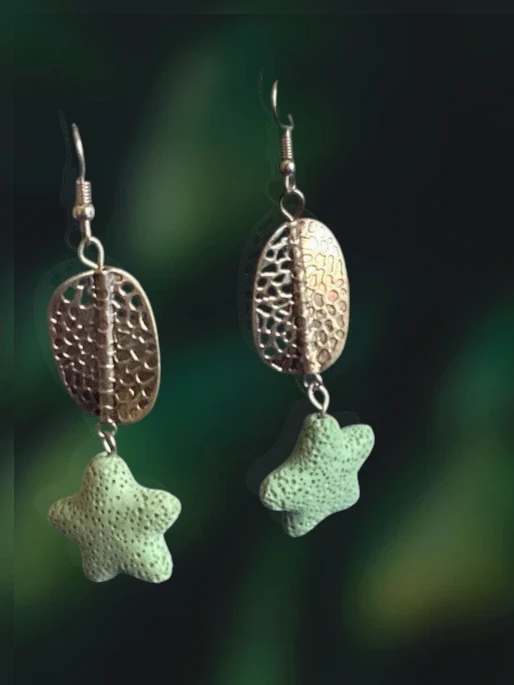 Heartfelt Creations star drop earrings with light green porous stone pendants and hammered silver-tone oval discs.