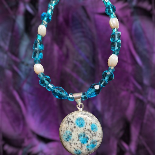 Heartfelt Creations handcrafted necklace featuring a K2 Blue Azurite pendant with turquoise glass beads and faux pearls.