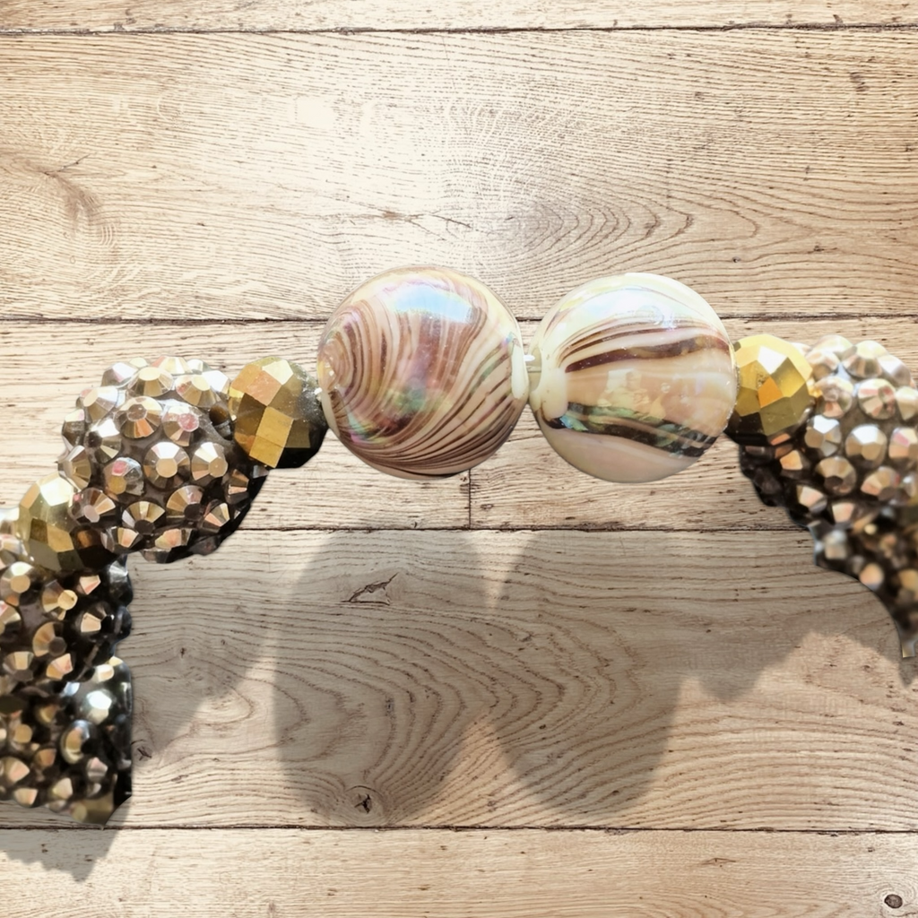 Heartfelt Creations handmade bracelet with large iridescent marbled beads, gold-tone faceted beads, and champagne rondelles.