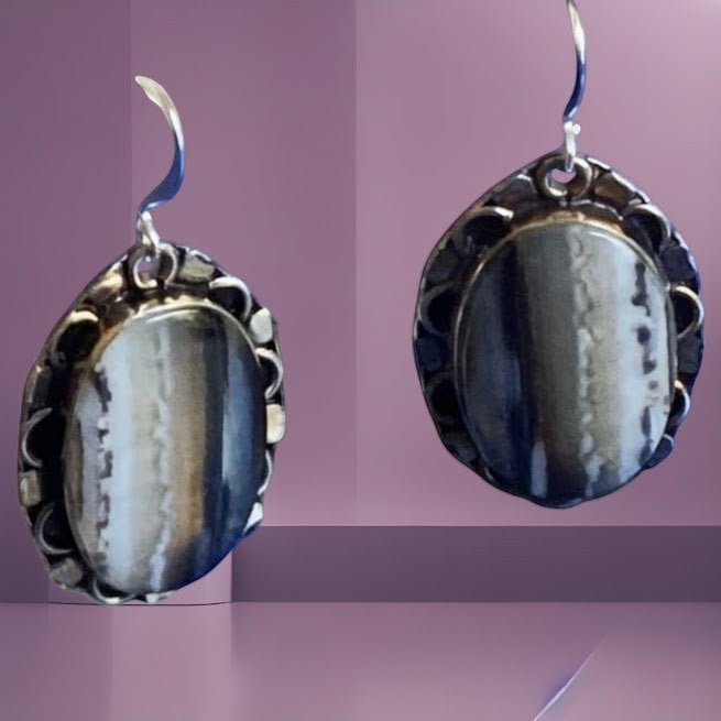 Heartfelt Creations oval drop earrings featuring polished grey and white banded stones in vintage scalloped metal frames.