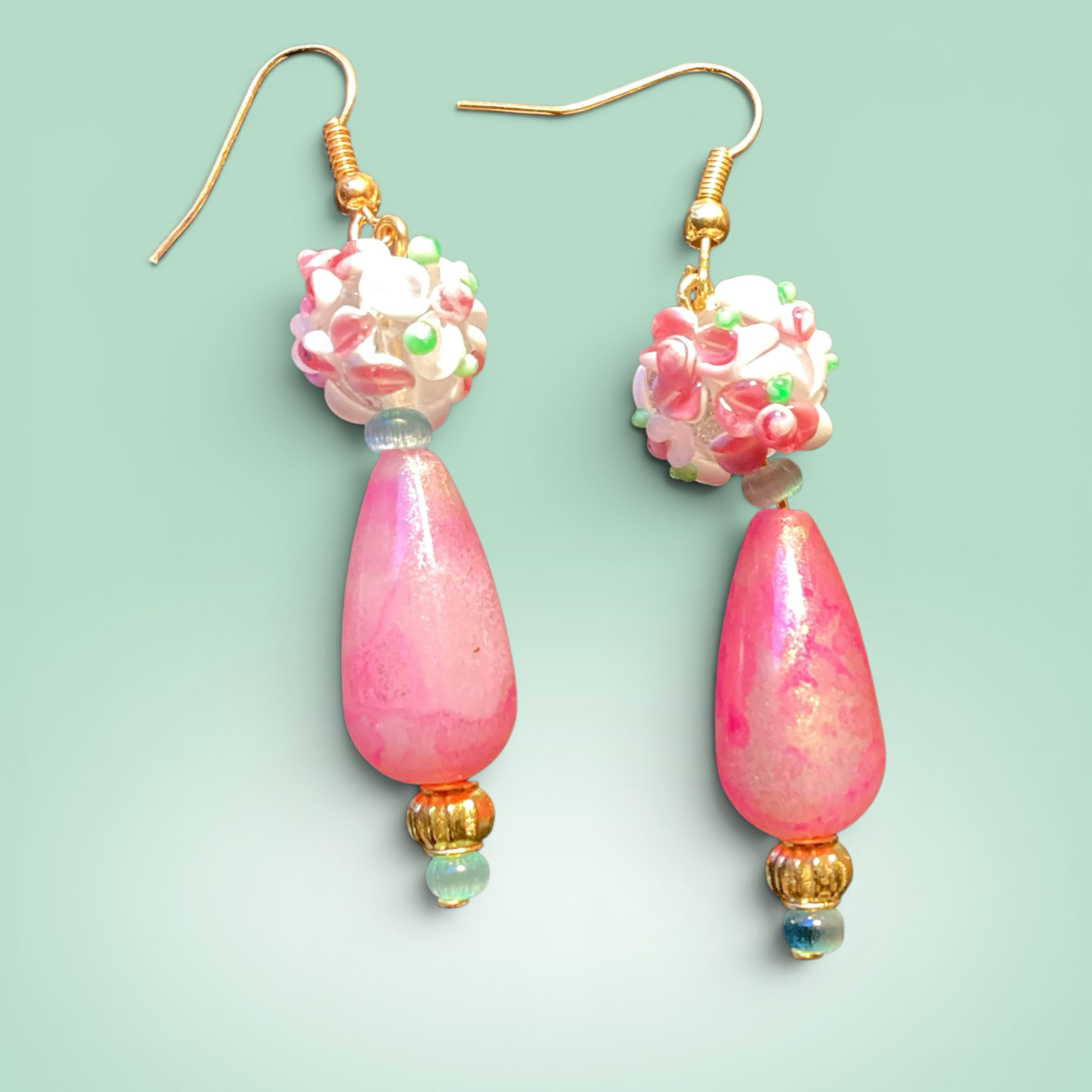 Heartfelt Creations pink jade-like teardrop dangle earrings with floral bead clusters and gold spacers.