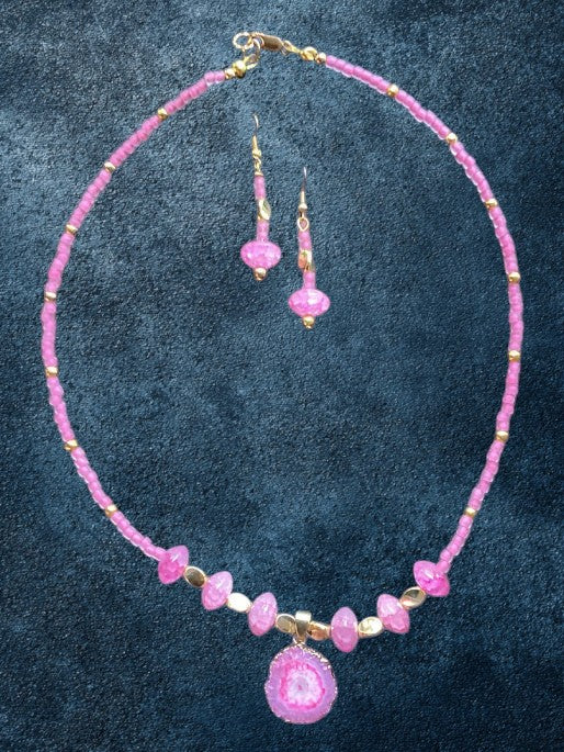 Heartfelt Creations hand-crafted   pink beaded necklace and earring set with a shimmering druzy agate pendant and gold accents.