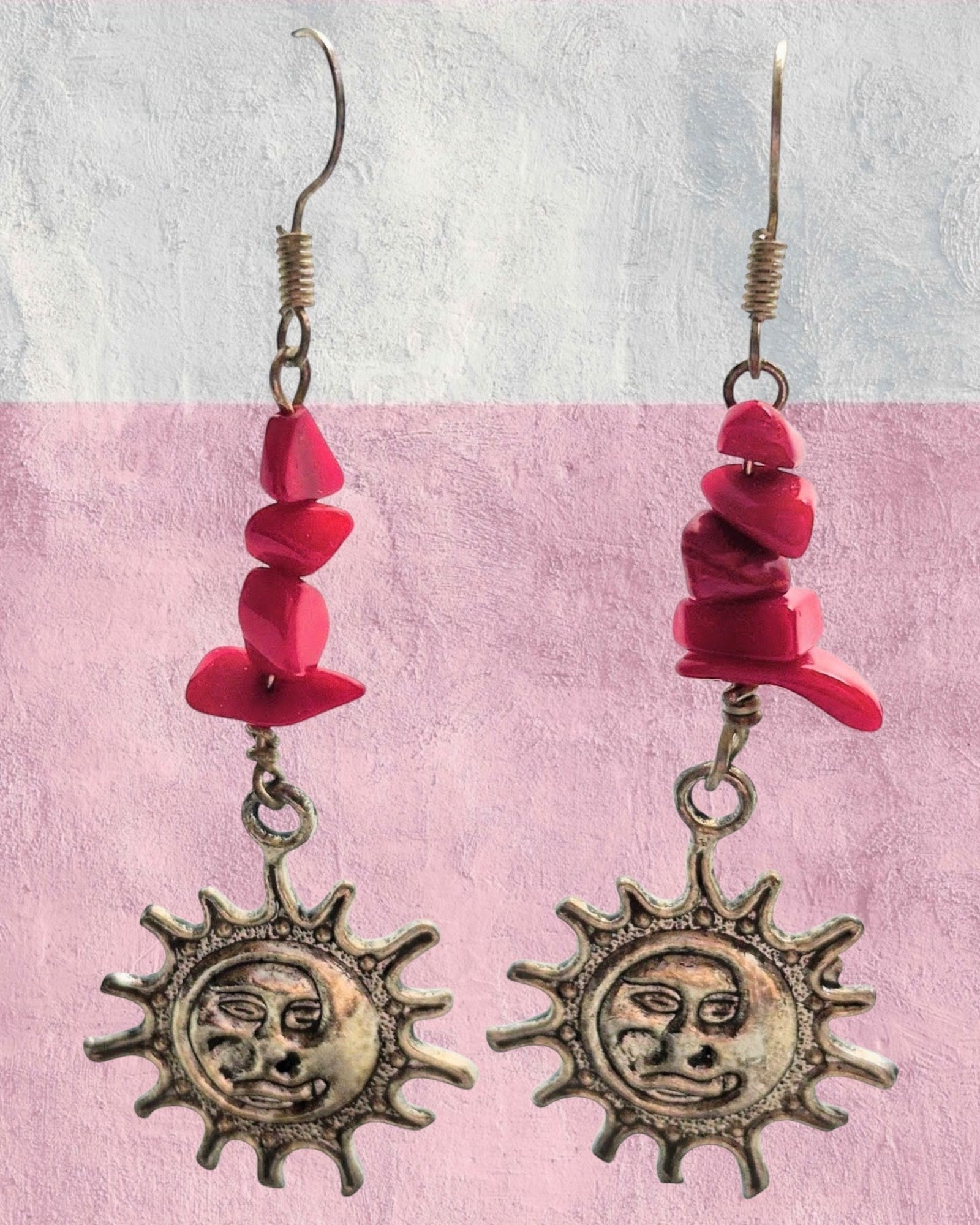 Heartfelt Creations celestial sun drop earrings with hot pink stone chips and antique silver sun pendants on hooks.