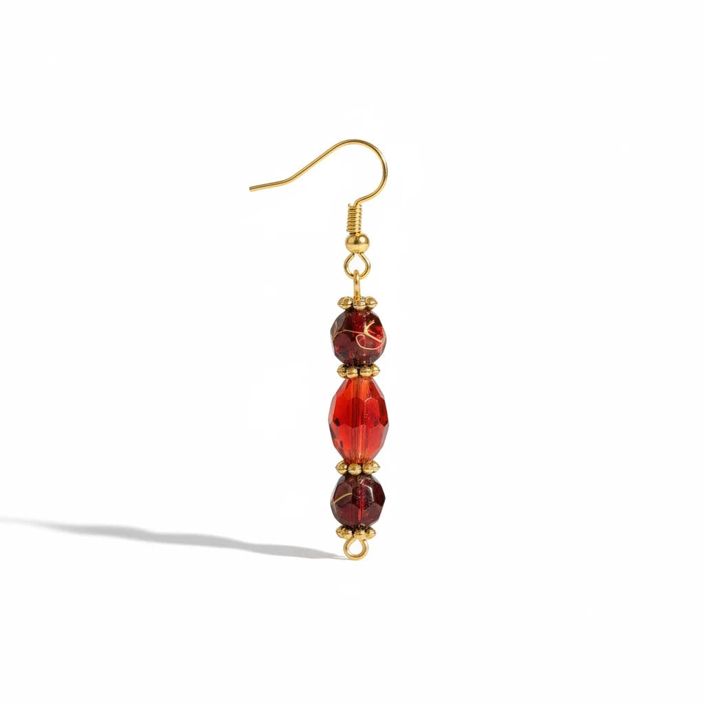 Heartfelt Creations red crystal beaded drop earrings with gold-tone accents and hook backings on a white background.