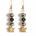 Heartfelt Creations dangling drop earrings featuring swirl glass beads, dark faceted beads, and gold-tone star charms.