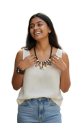 Heartfelt Creations artisan statement necklace and bracelet set with bone-like pendants and black beads on a model