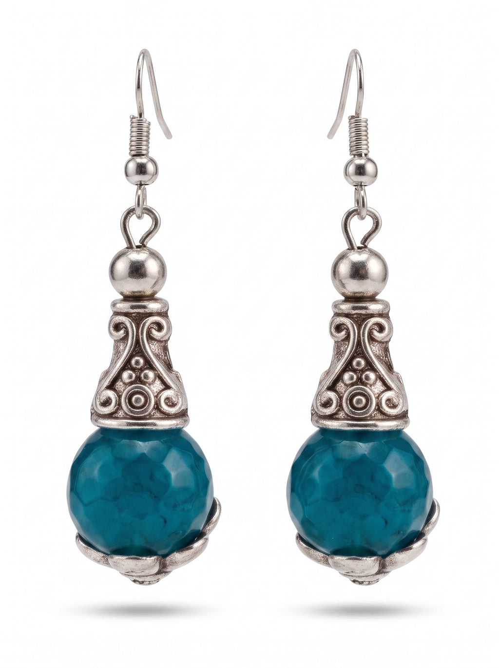 Heartfelt Creations ornate drop earrings with faceted teal stones and antiqued silver scrollwork metal detailing.