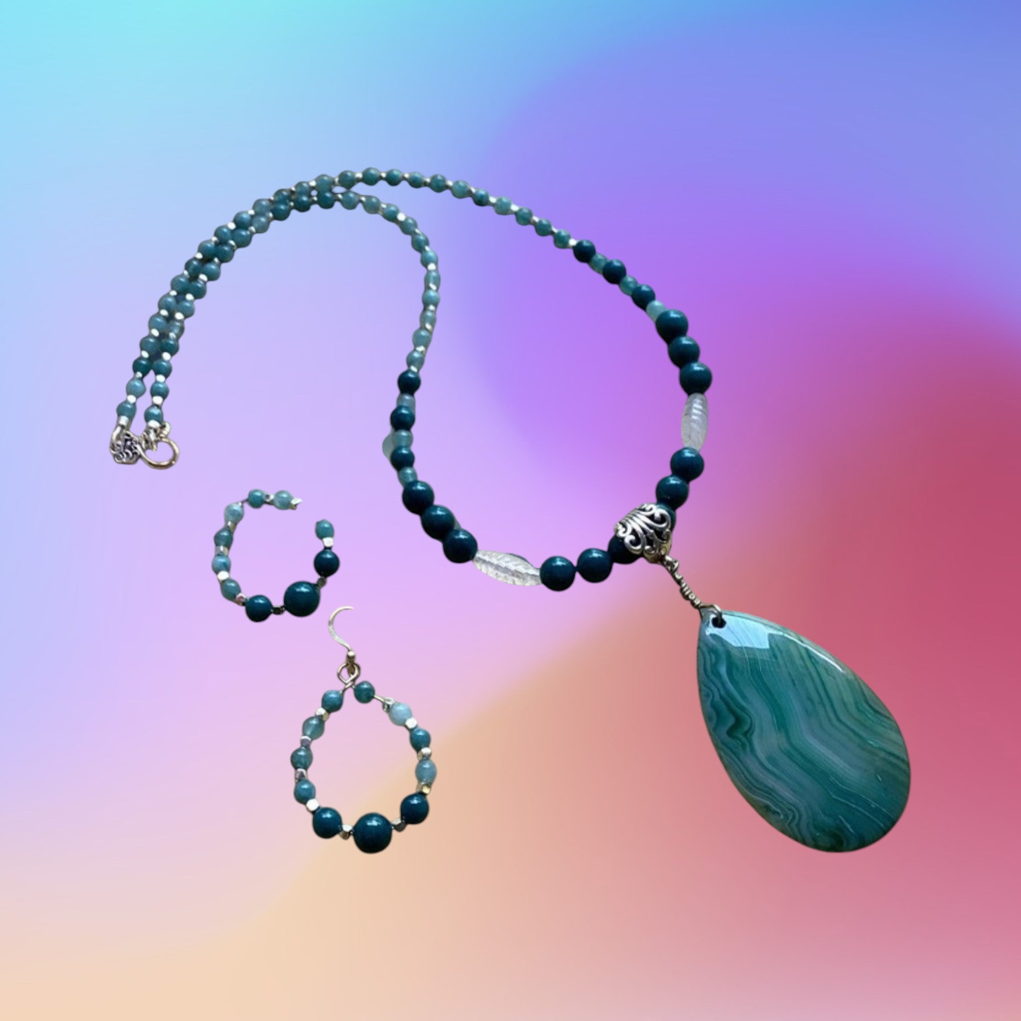 Heartfelt Creations teal beaded necklace with green agate teardrop pendant and matching hoop earrings set.