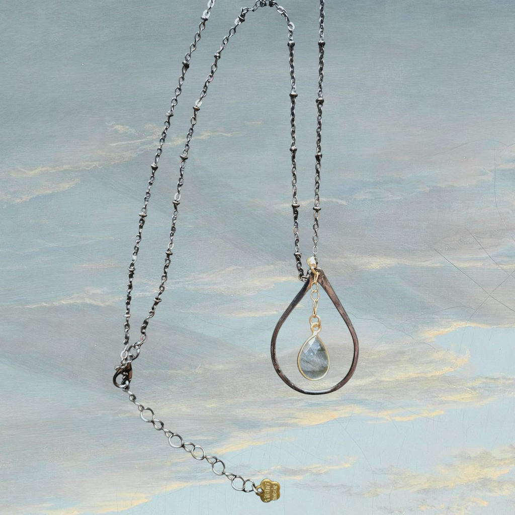 Heartfelt Creations teardrop pendant necklace with clear gemstone accent and oxidized metal chain with textured beads.