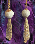 Heartfelt Creations elegant drop earrings featuring frosted white beads and ribbed gold-tone metal on purple feathers.