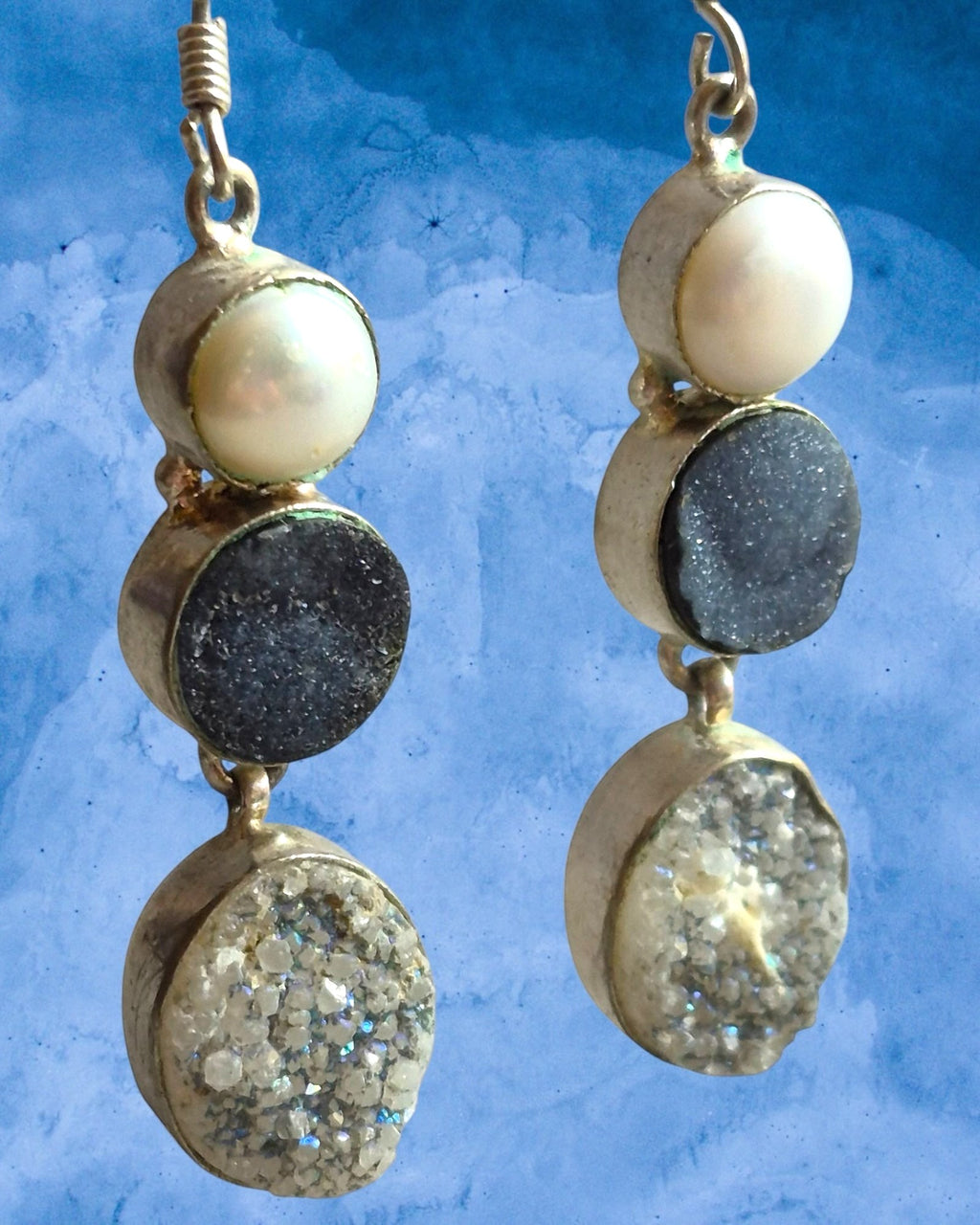 Heartfelt Creations triple drop earrings featuring a white pearl, charcoal druzy, and crystal druzy in sterling silver.