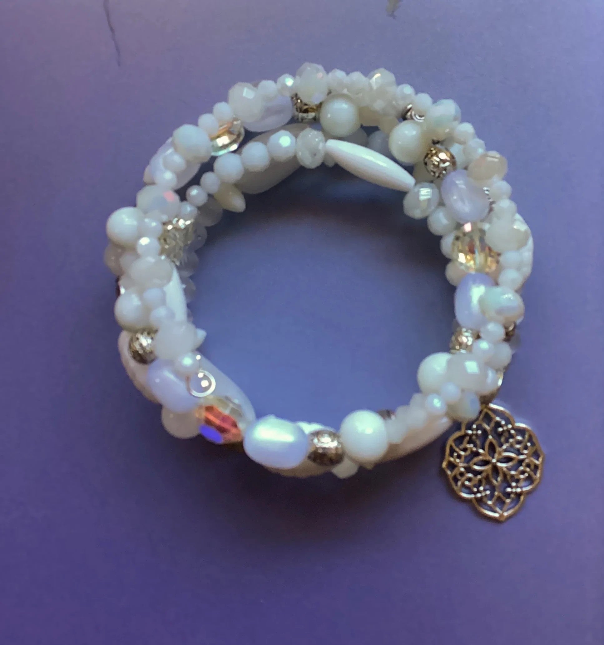 Heartfelt Creations white beaded bracelet with pearls, crystals, and silver-tone filigree charm.