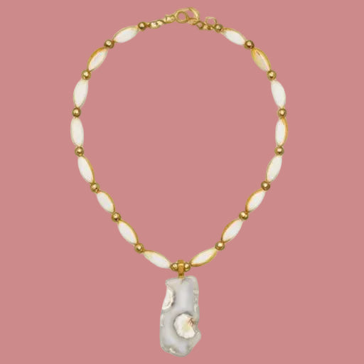 A gold-tone beaded necklace featuring elongated white shell-like beads and a large irregular white shell pendant, displayed on a clean white background.,