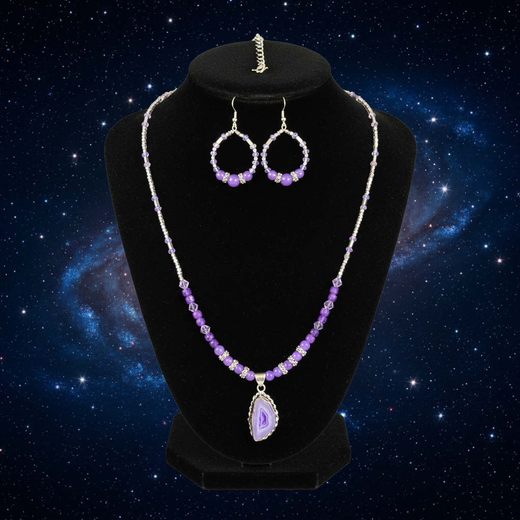 Purple beaded necklace with a pendant and matching earrings on a purple background