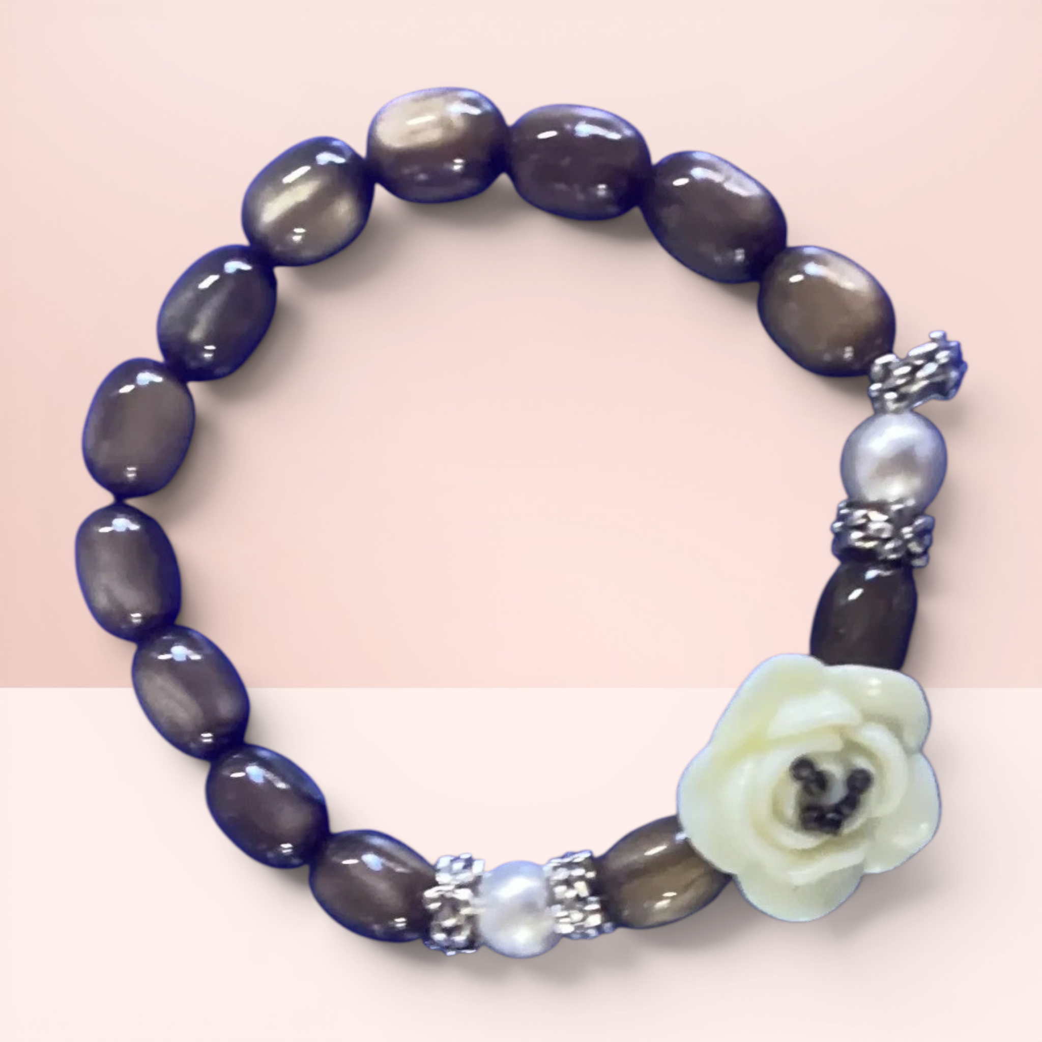 Elegant Beaded Bracelet with Floral Accent