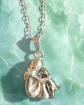 Girl Hugging Her Dog Pendant Necklace